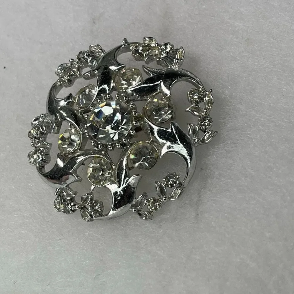 Vintage rhinestone swirl starbust open cut atomic area brooch. - Picture 2 of 7